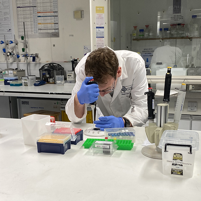 Dr John Walsby-Tickle pipetting onto a MALDI target plate