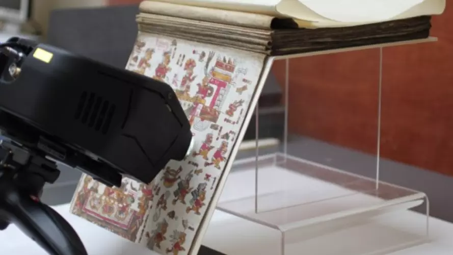 Image showing a raman spectrometer analysing a codex